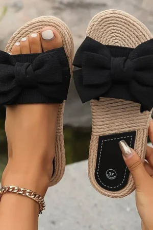 Sandales plates gros noeud noir semelle en paille