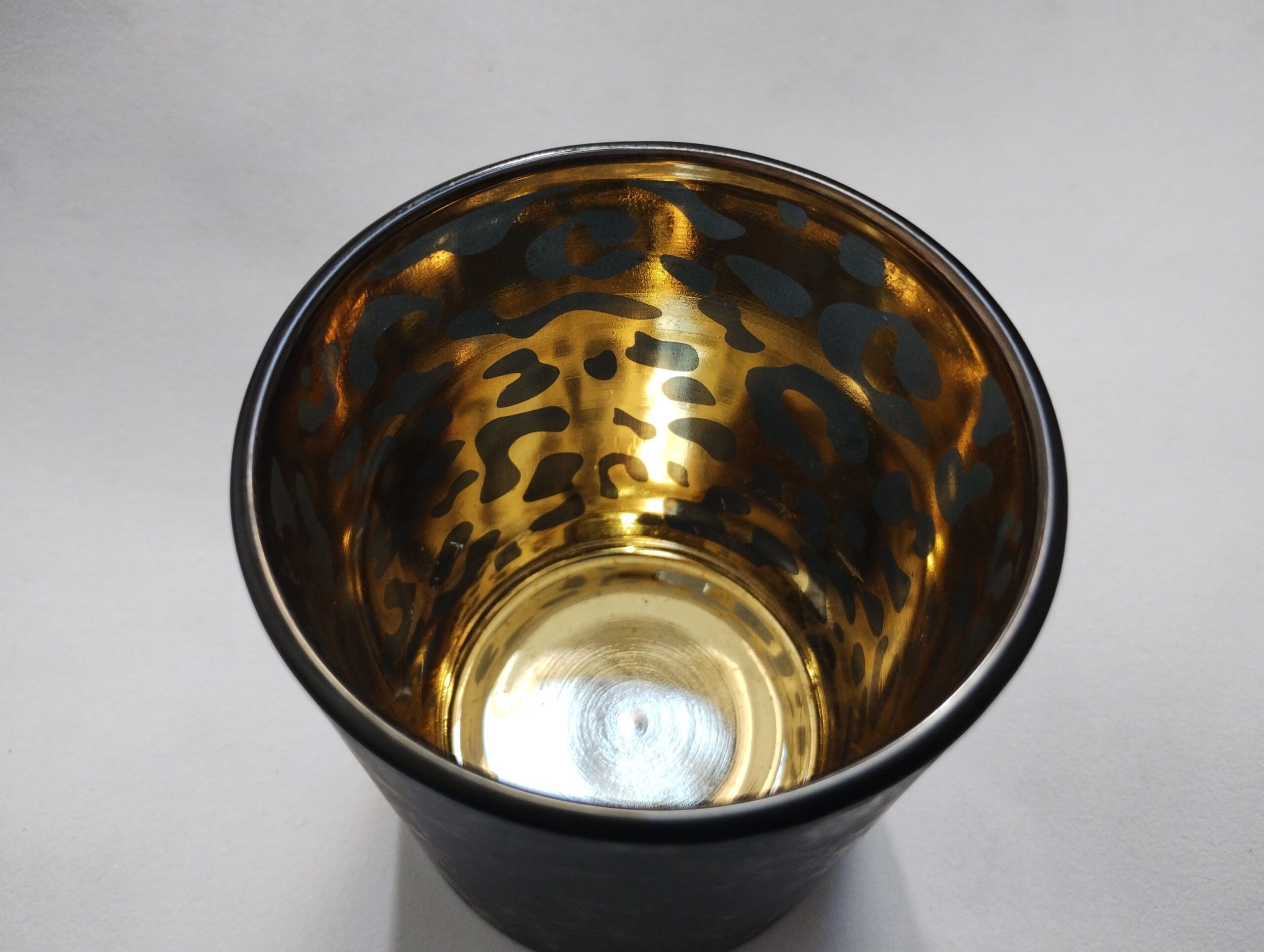 Verre porte bougie imprimé léopard noir et or