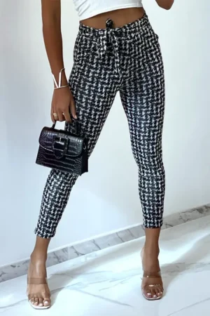 Pantalon slim noir motifs