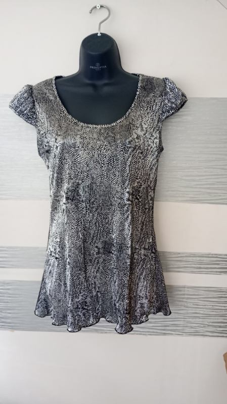 Top brillant argenté épaules bouffantes