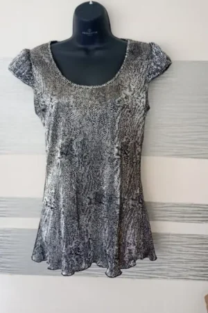 Top brillant argenté épaules bouffantes